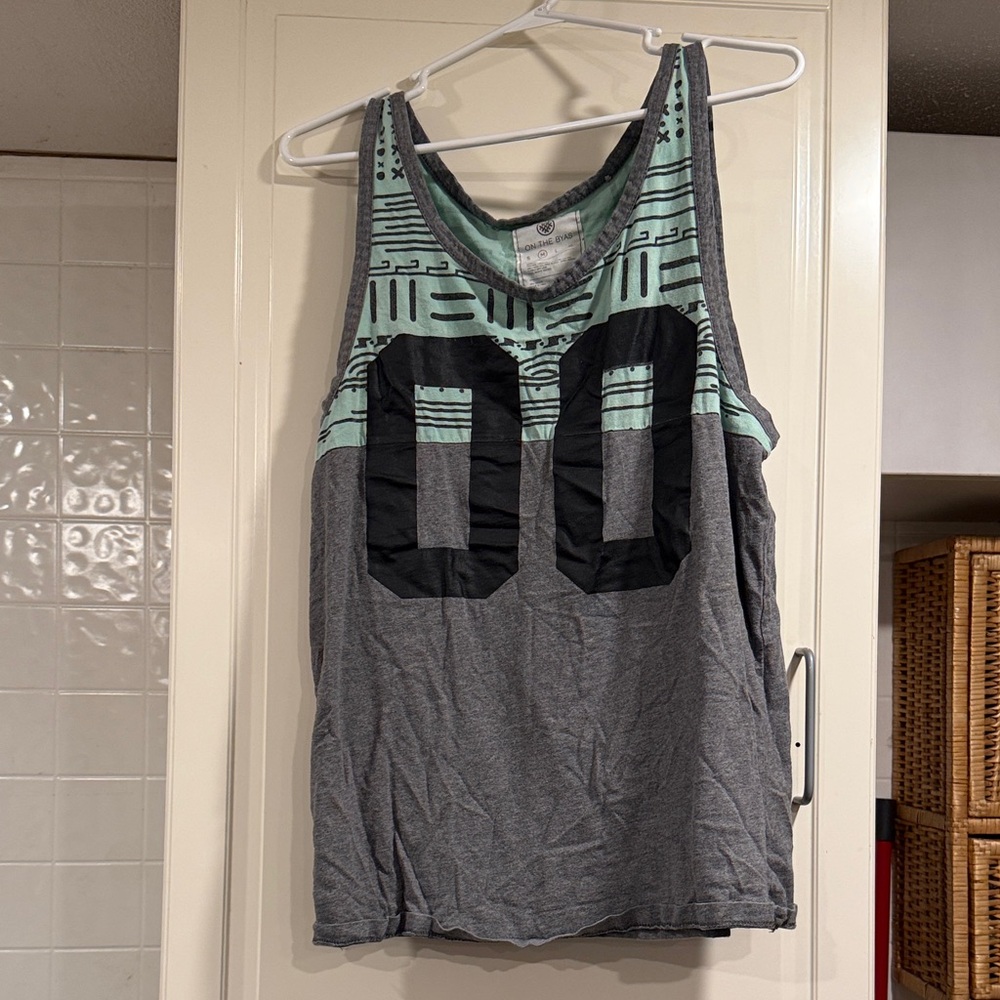 On the Byas Mint and Gray Tank Top size medium 12:22 100% cotton🎶